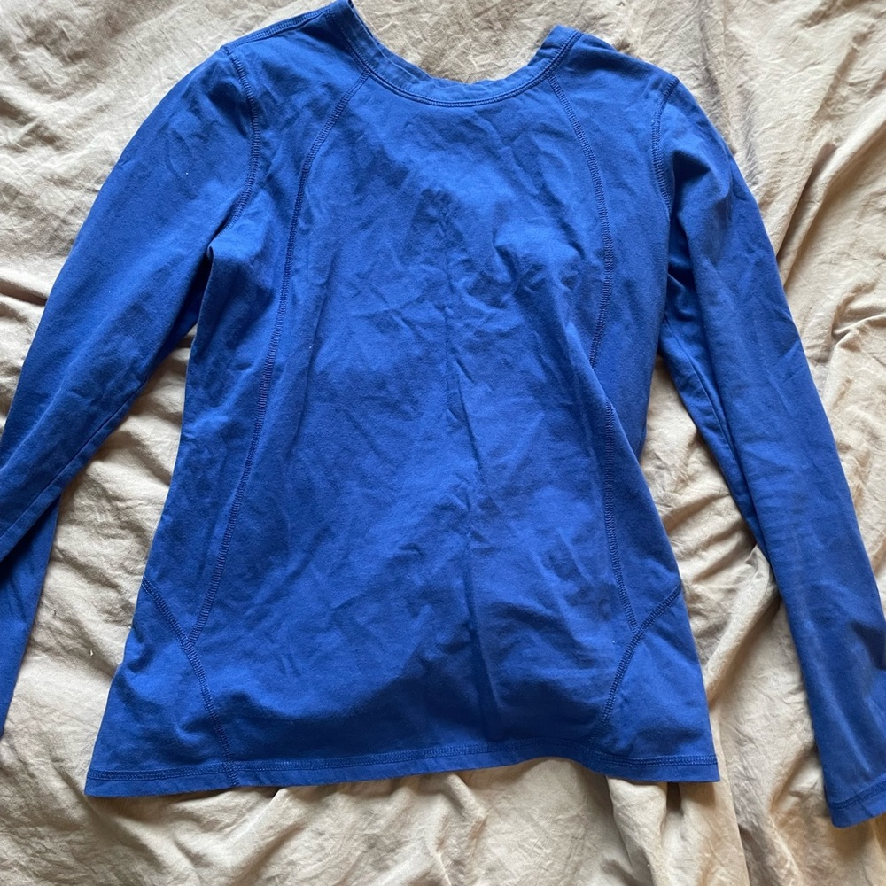 TekGear bright blue long sleeve shirt, size small but fits like and XS.